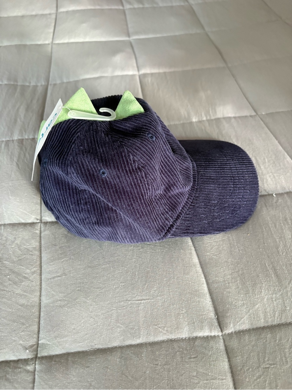 New with tags, corduroy Dino hat for toddlers, size 2T-4T